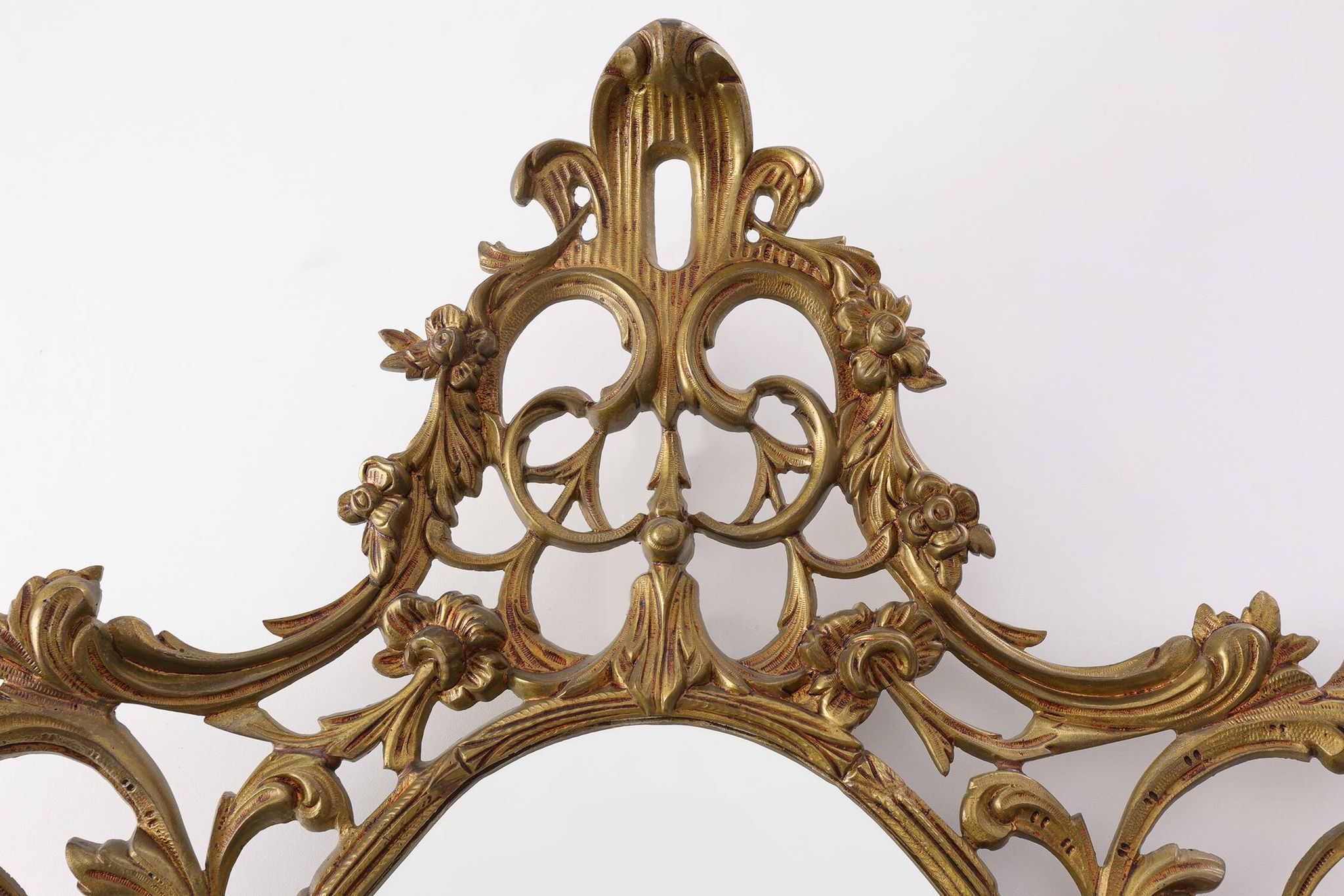 Miroir ovale en métal doré de style rococo, Italie, 20e siècle