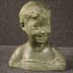 Sculpture in bronze painted terracotta bust of a child
