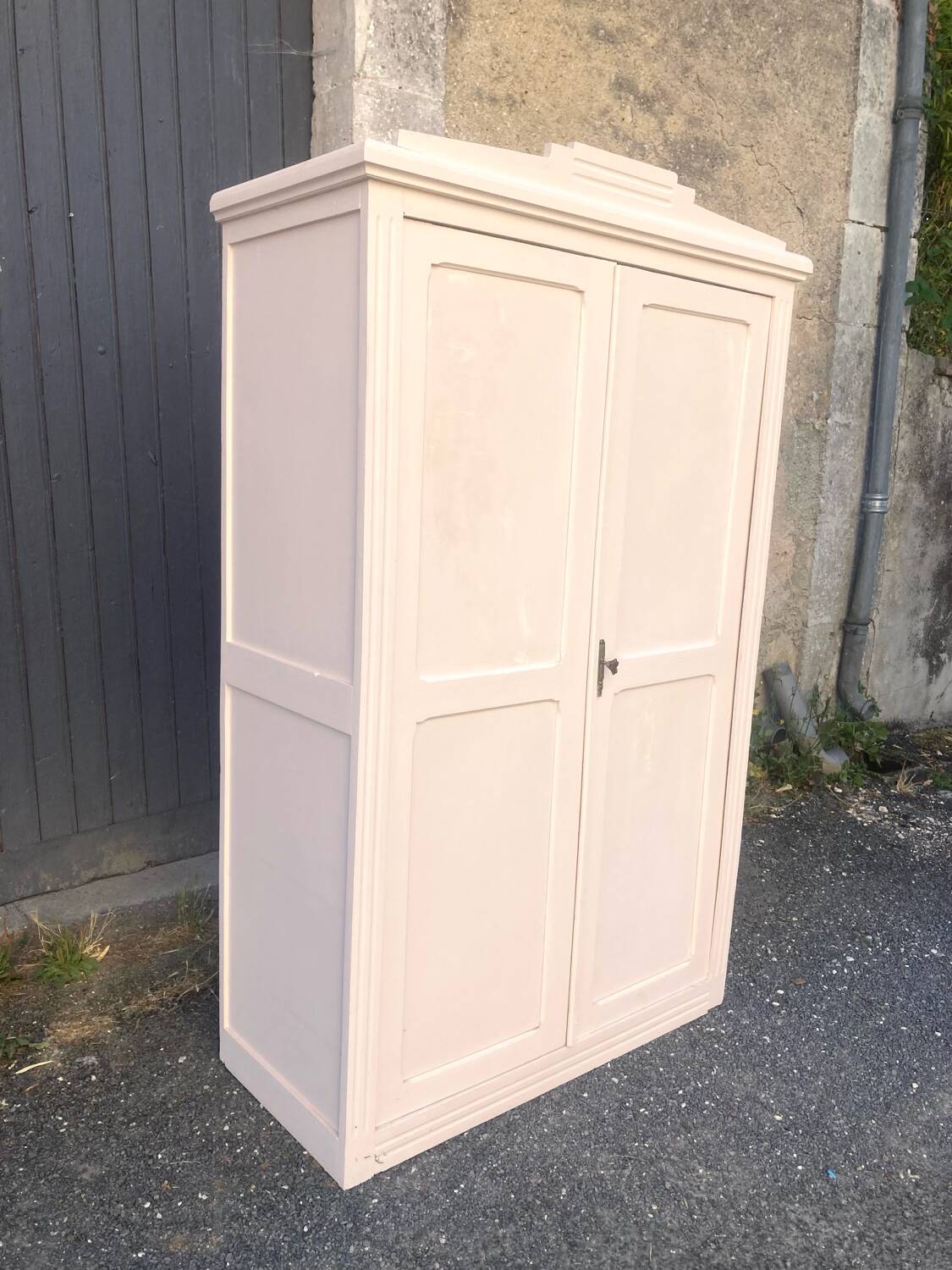 Small powder pink Parisian wardrobe