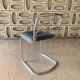 Chaises chromées avec assises retapissées