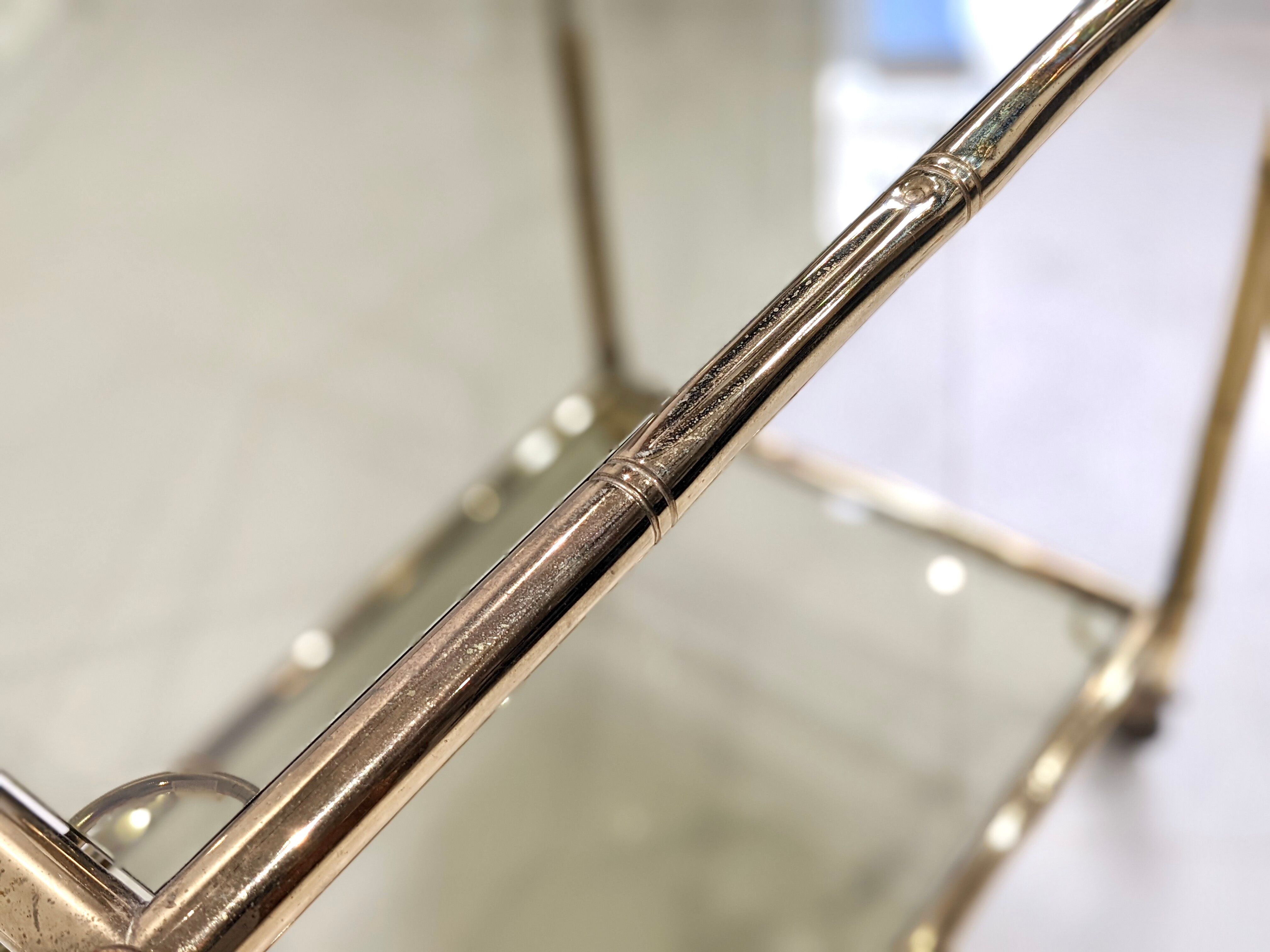 Golden metal dessert with tinted glass tops