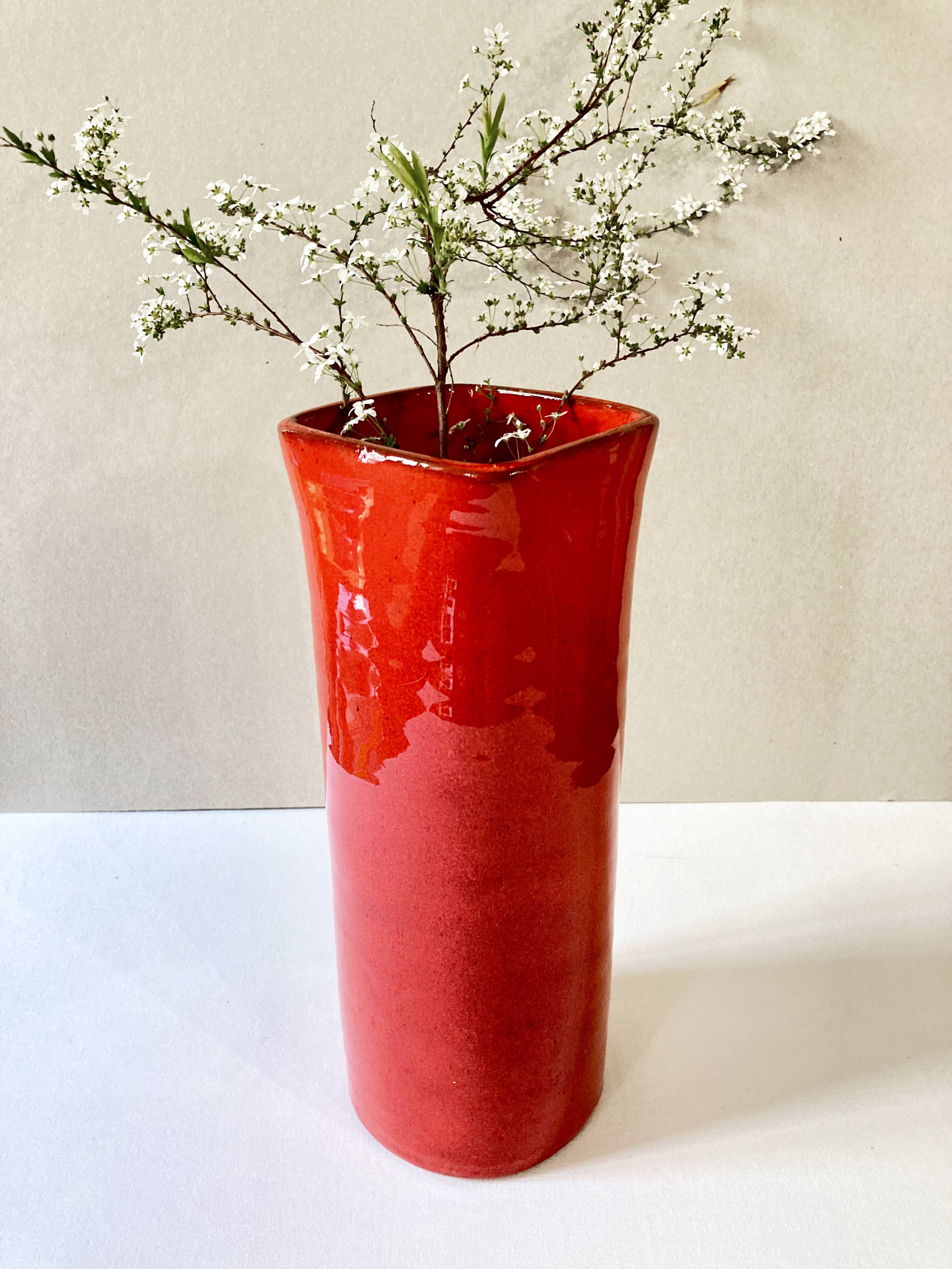 Large red glazed ceramic vase