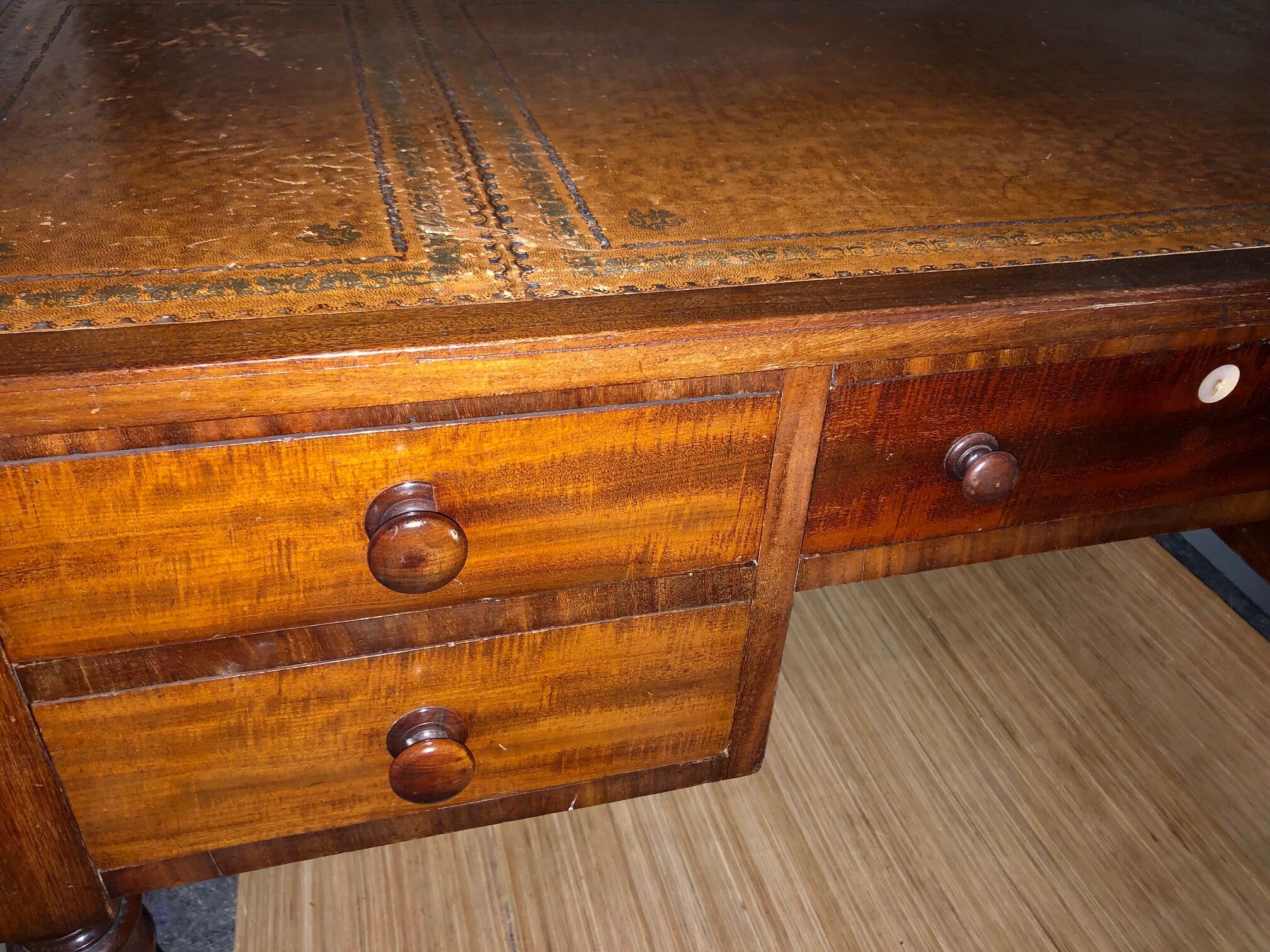 Antique mahogany desk with leather top