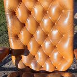 Paire de fauteuils cuir de style chesterfield