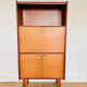 Wood veneer secretary from the 1970s.