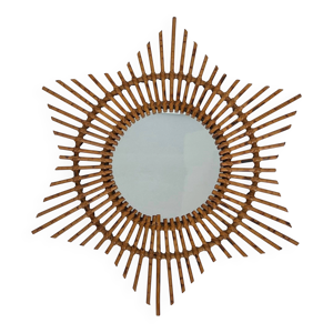 Miroir en rotin représentant