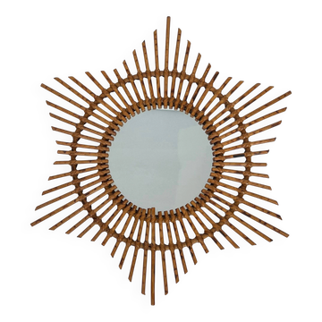 Rattan mirror in the shape of a star.