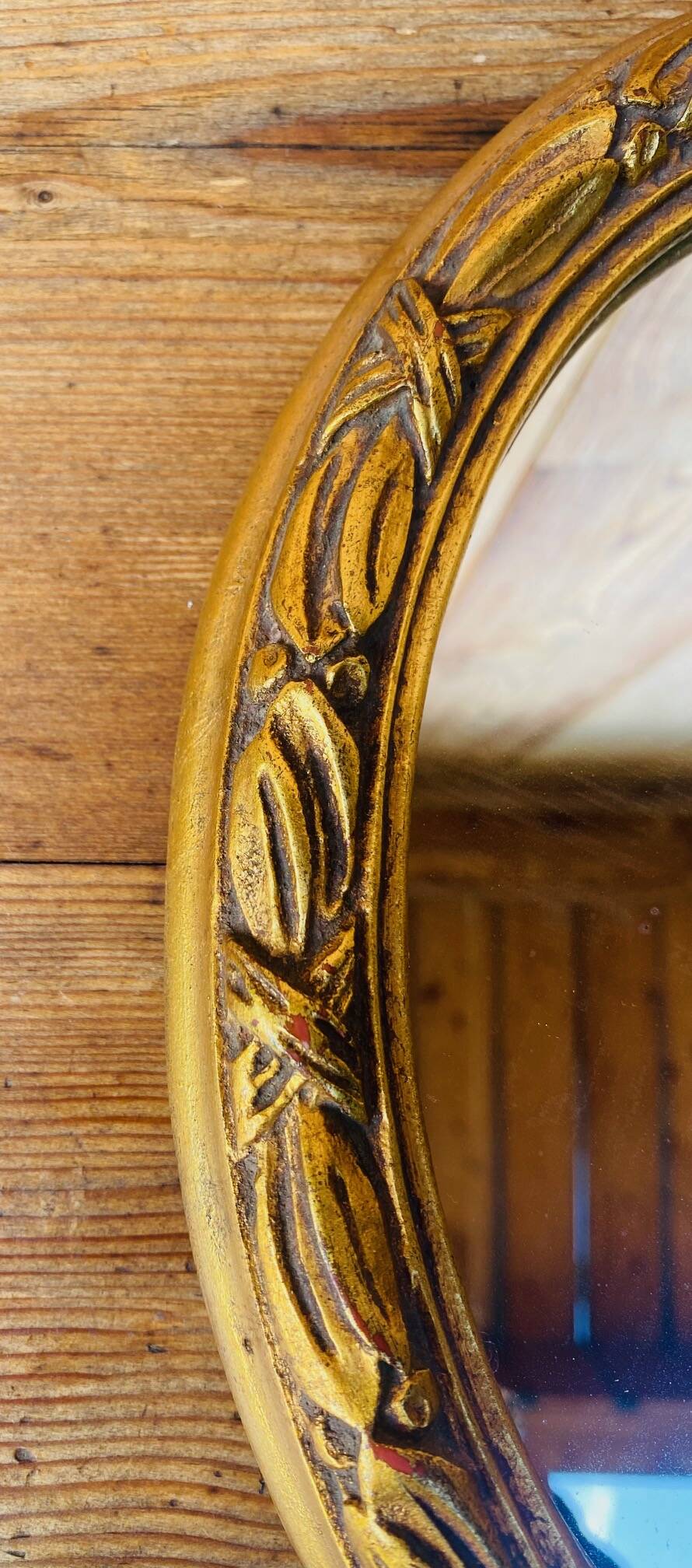 Small antique oval gilt mirror