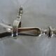 Leg of lamb handle, silver metal tongs and lined silver handle