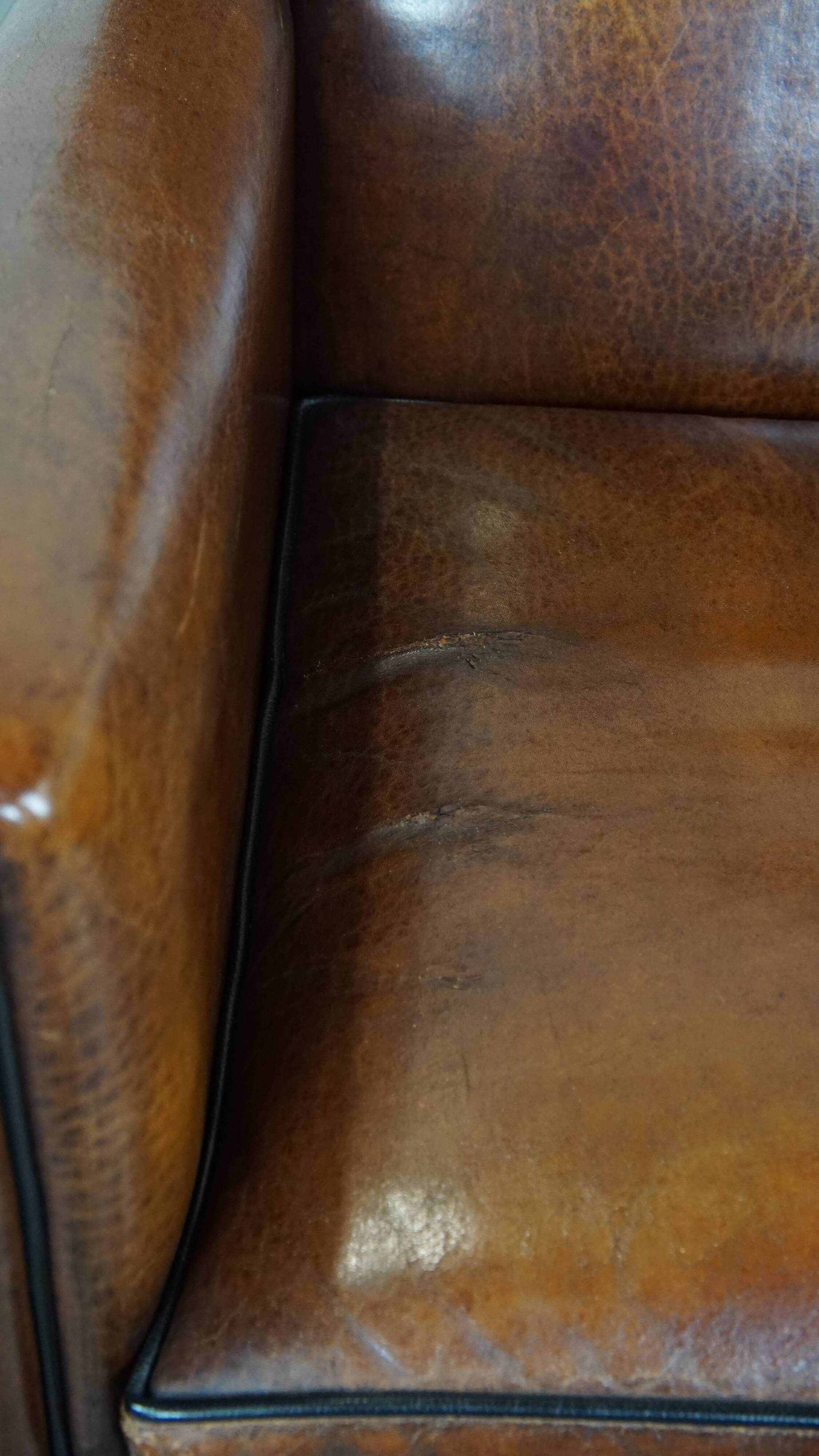 Cognac-colored sheep leather Art Deco design armchair finished with piping