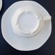 4 White cups and saucers