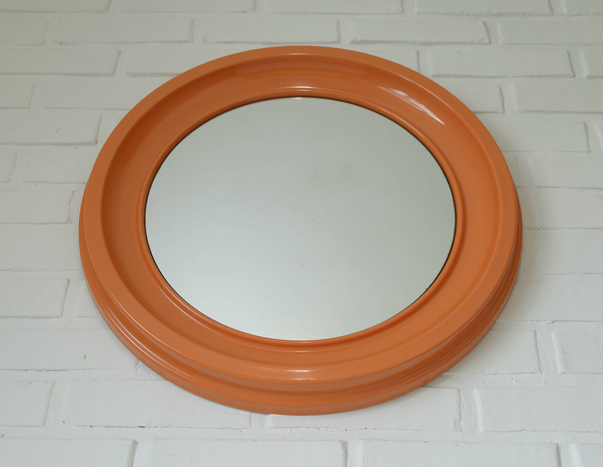 Orange vintage round wall plastic mirror 1980s, space age vanity mirror