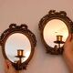 Pair of Swedish brass sconces with mirror