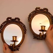 Pair of Swedish brass sconces with mirror