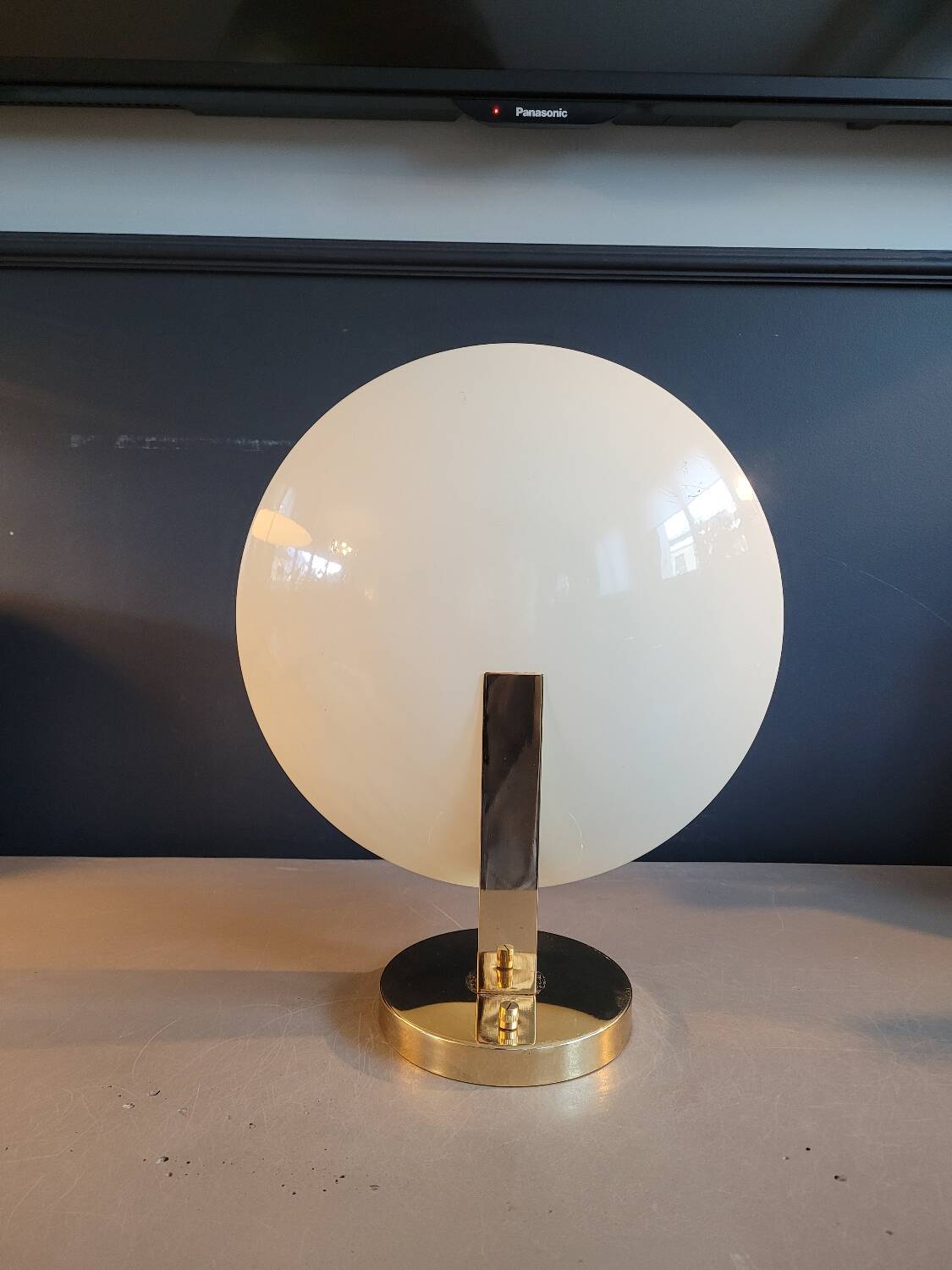 Gold and cream white saucer wall sconce