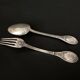 Pair of Gorini silver cutlery, Empire style, Minerva hallmark and richly decorated monogram