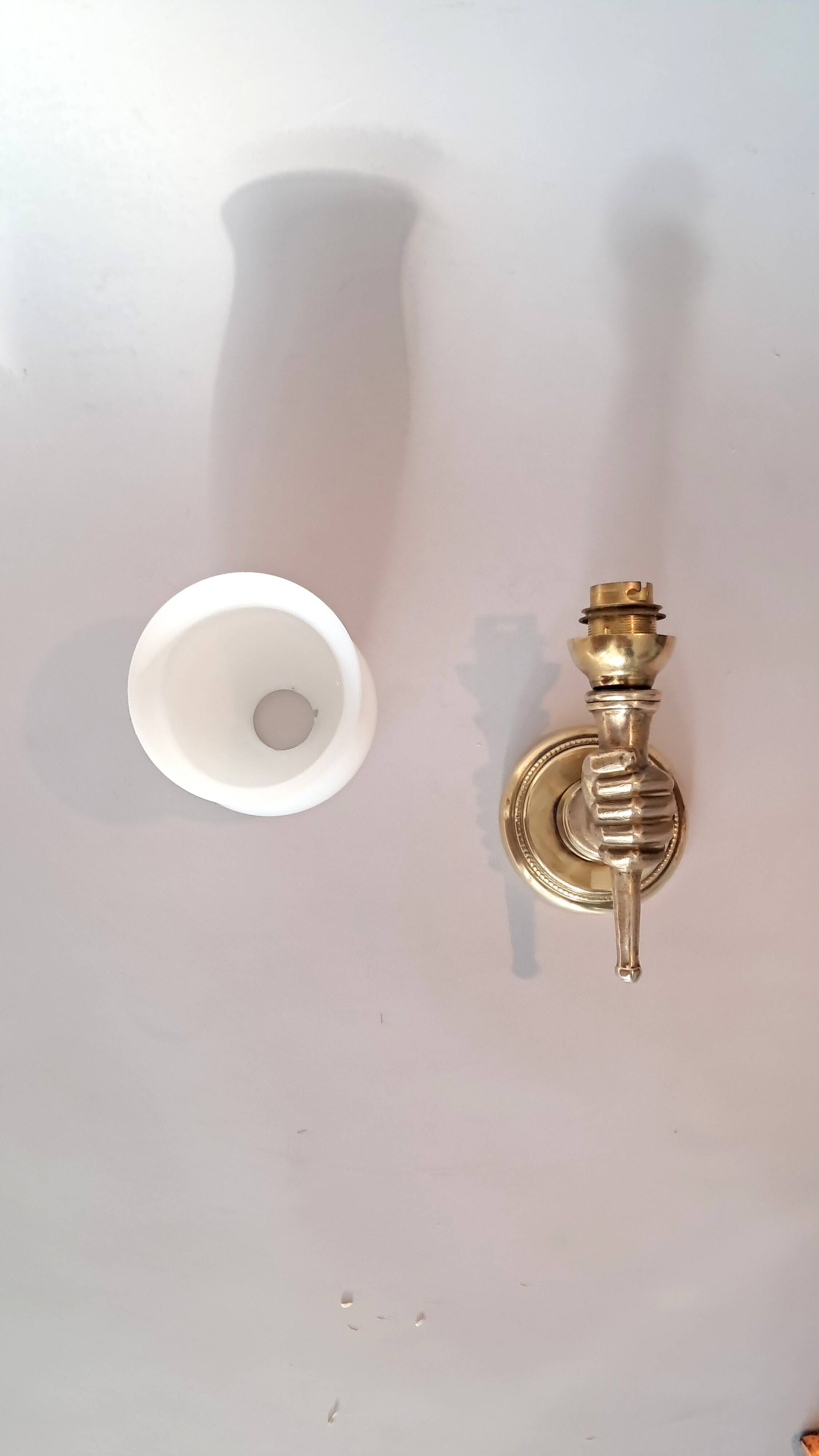 Golden brass wall light from the 1950s.