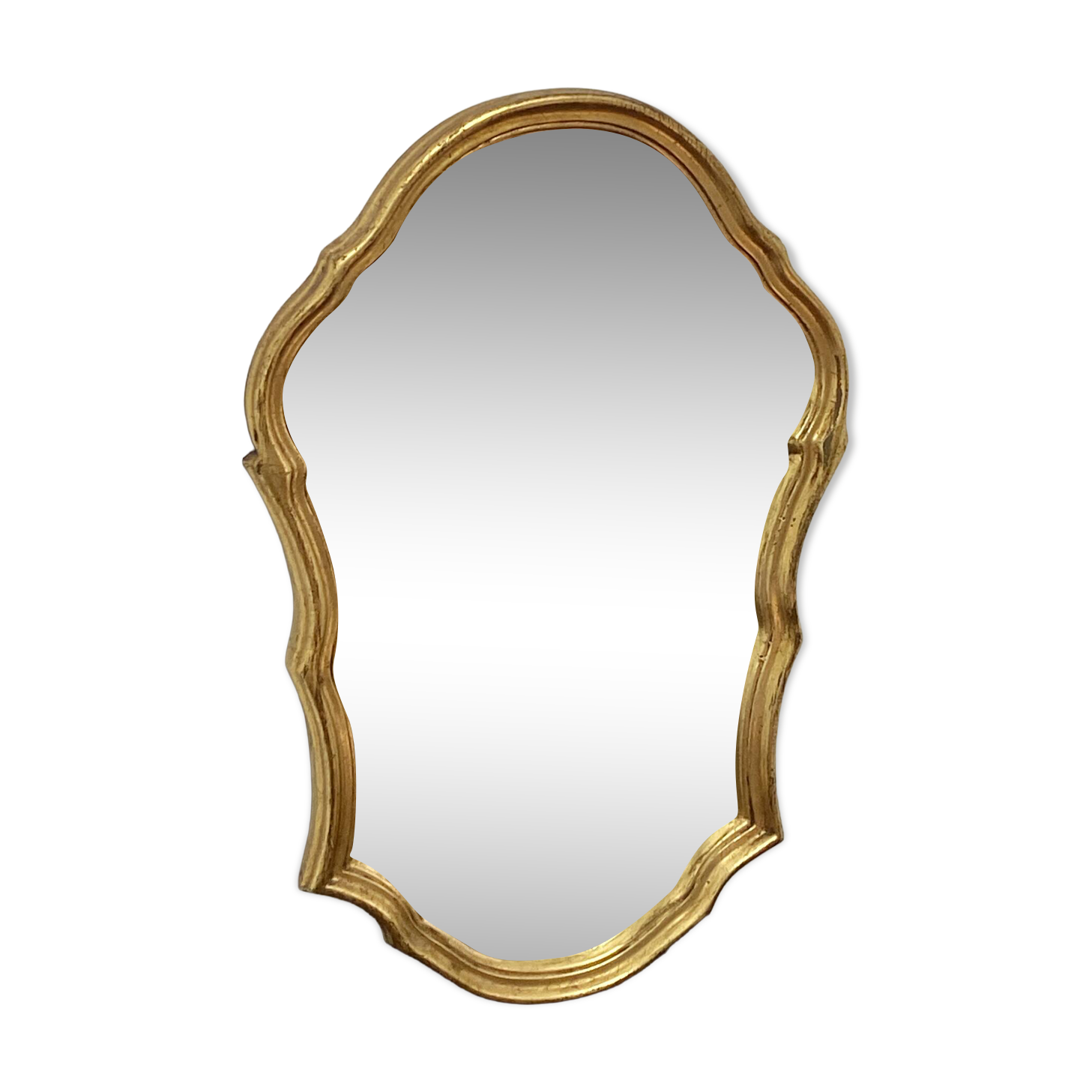 Large baroque mirror in gilded wood