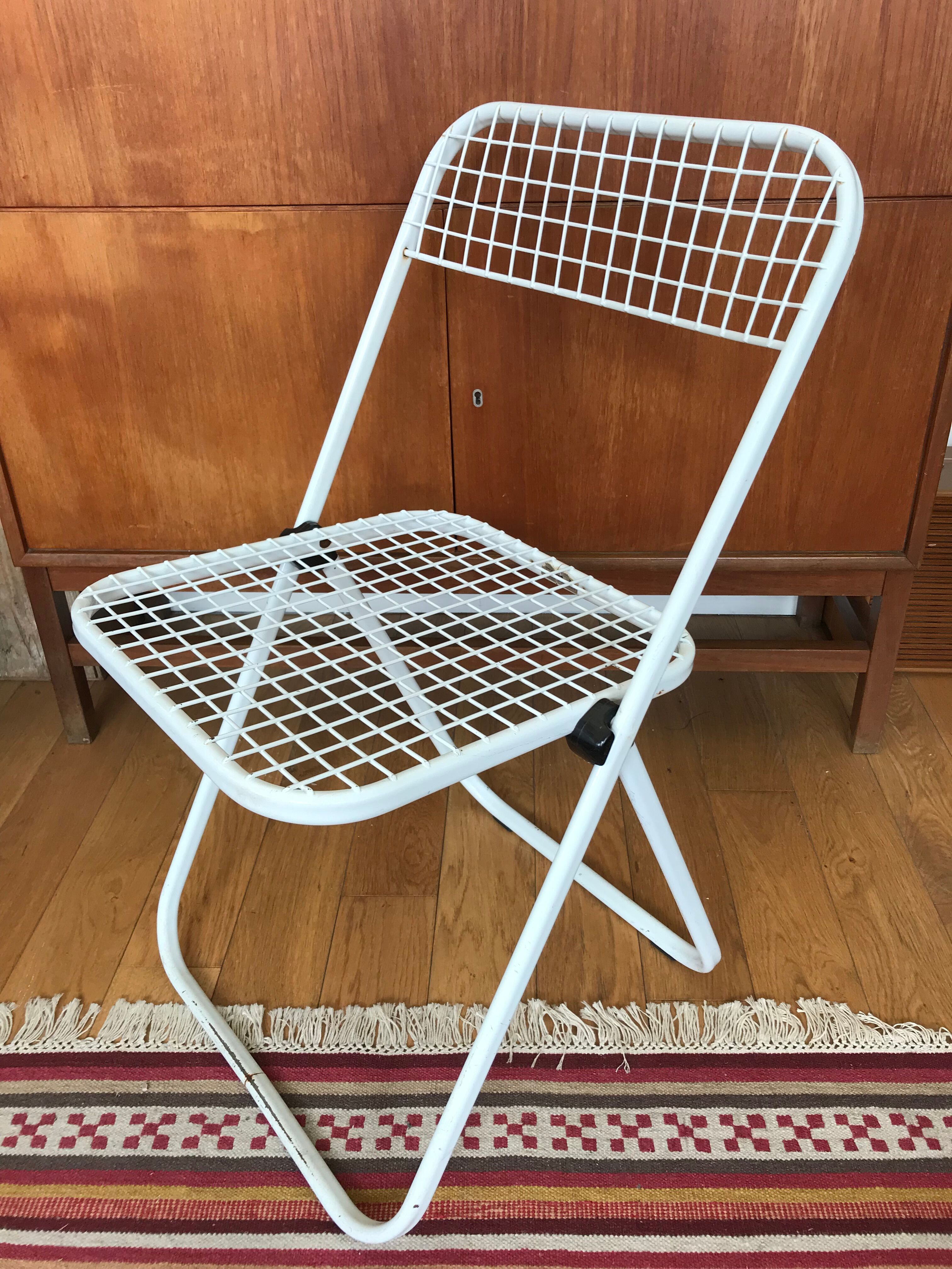 Metal folding chair by Talin Editions