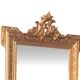 Louis XV style gilded mirror and carved wooden frame