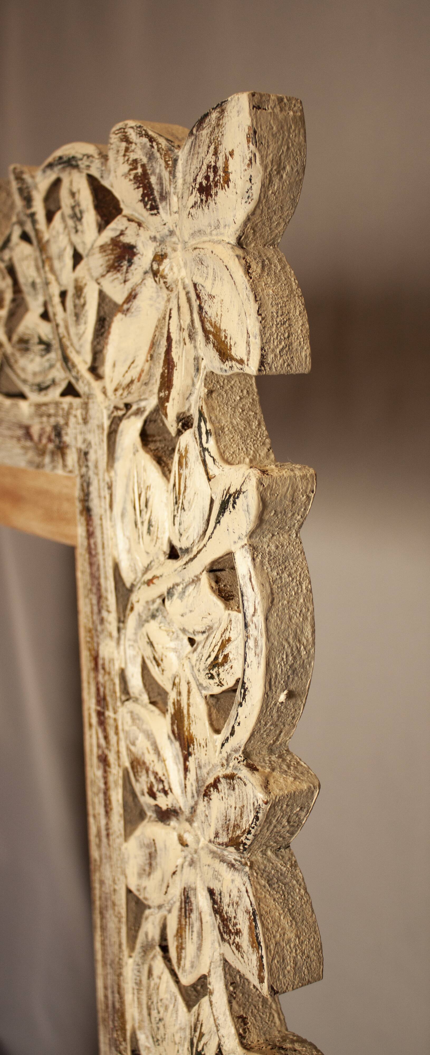 Carved wooden frame. carved wooden frame with floral motifs.