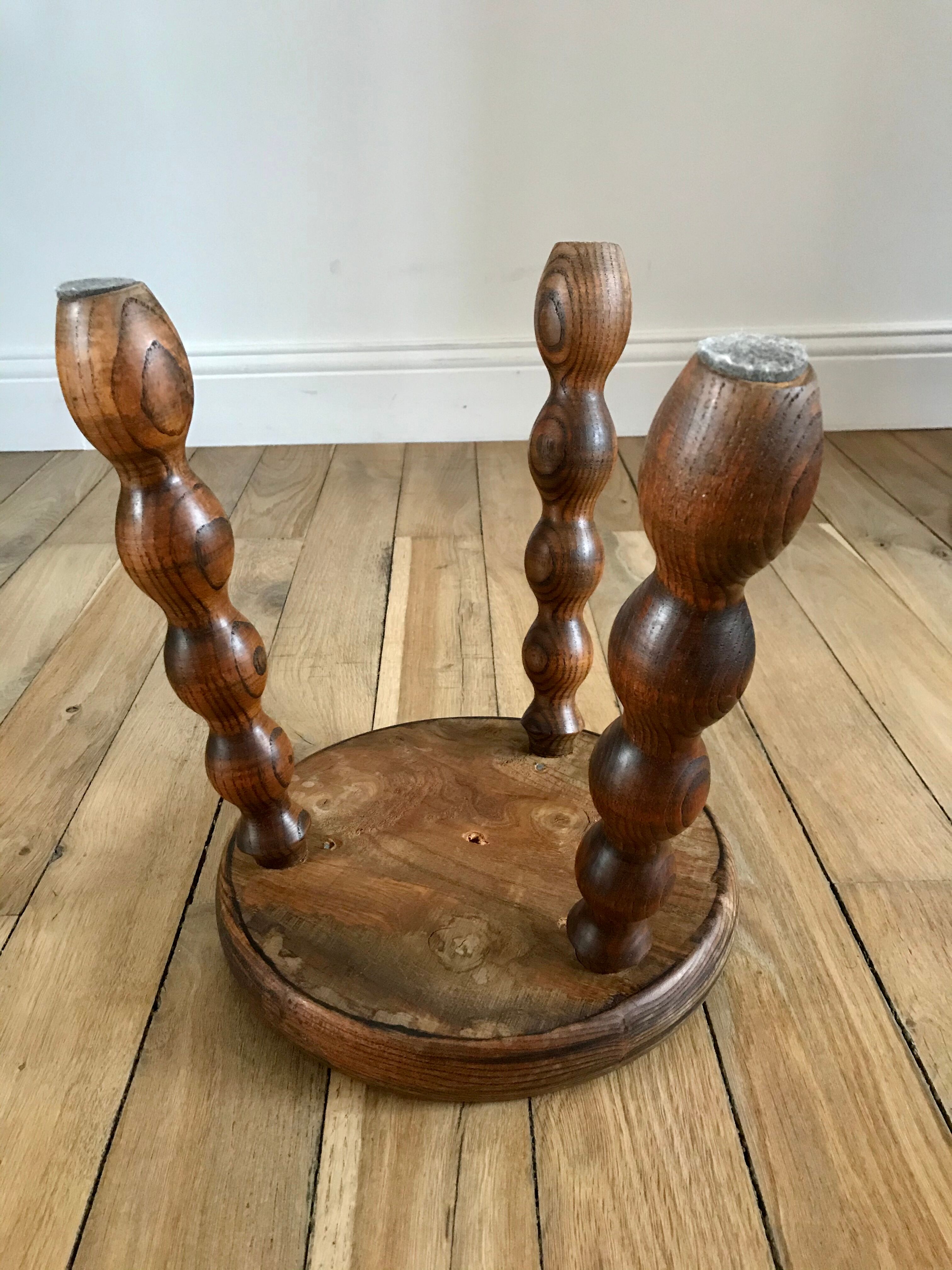 Low wooden stool turned solid 70s