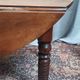 19th-century Louis Philippe walnut drop-leaf table.