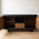 Buffet in Art Deco style made of blackened wood and carved oak.