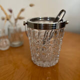 Ice bucket with its pliers