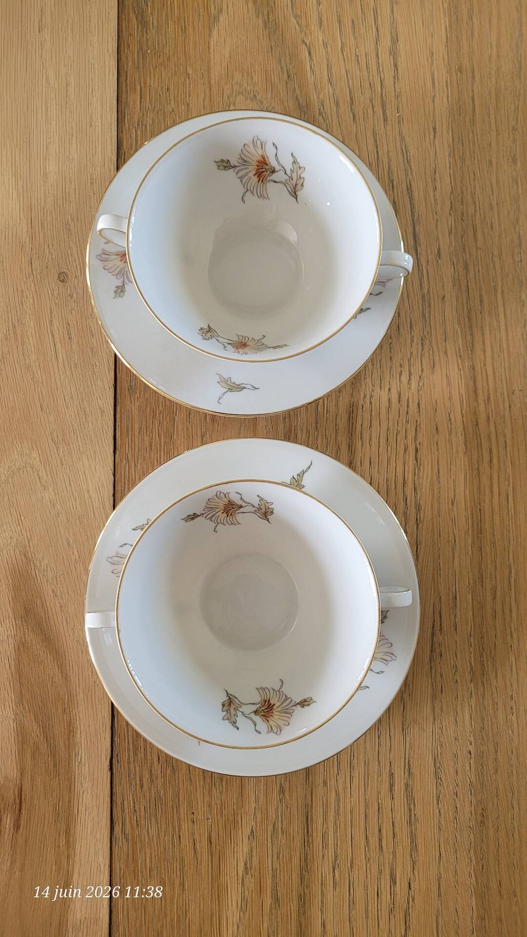 2 large antique cups and their saucers