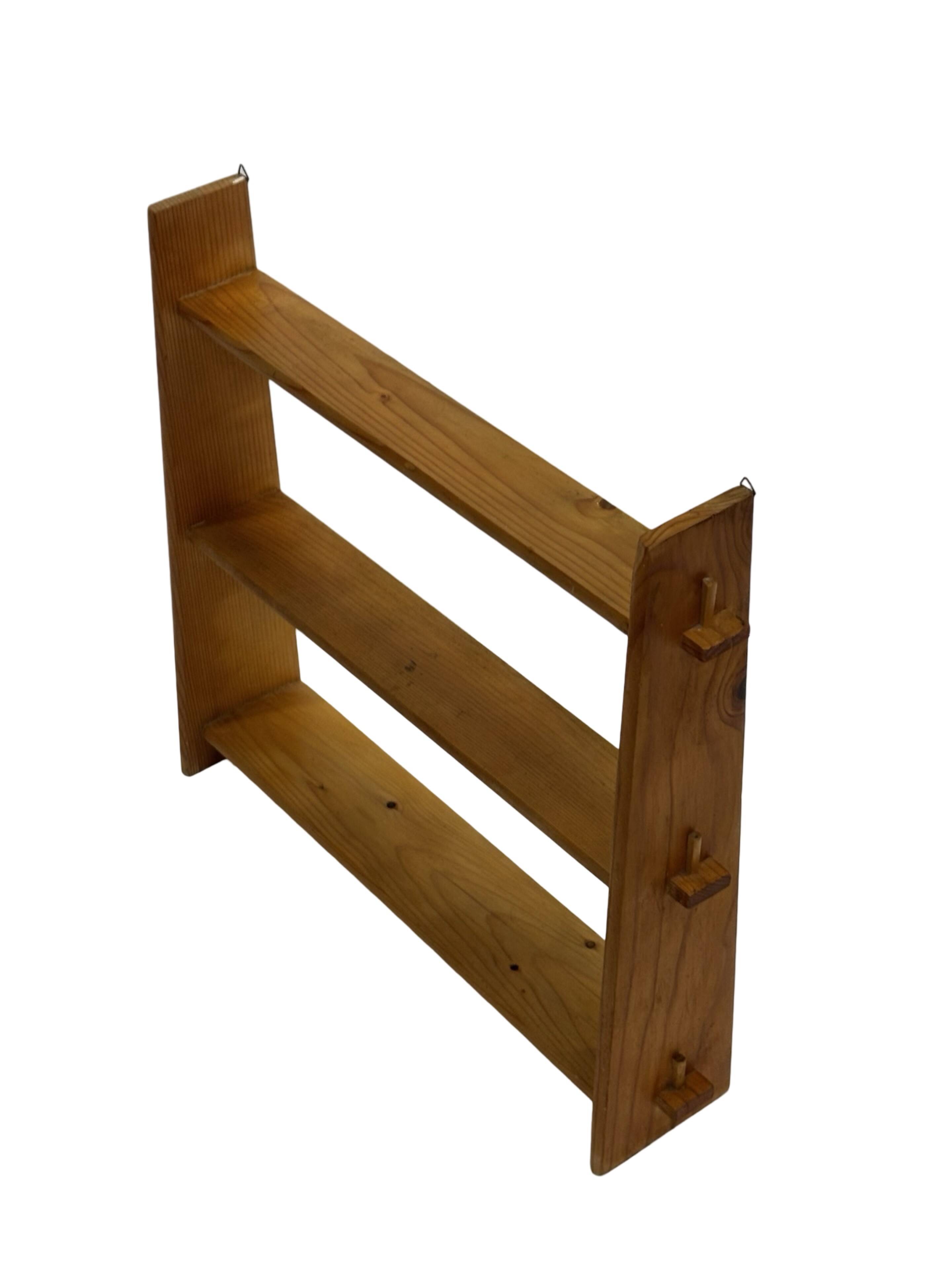 Vintage wooden wall shelve rack bookshelf in pinewood minimalist design
