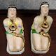 Pair of polychrome porcelain night light statues in Art Nouveau style