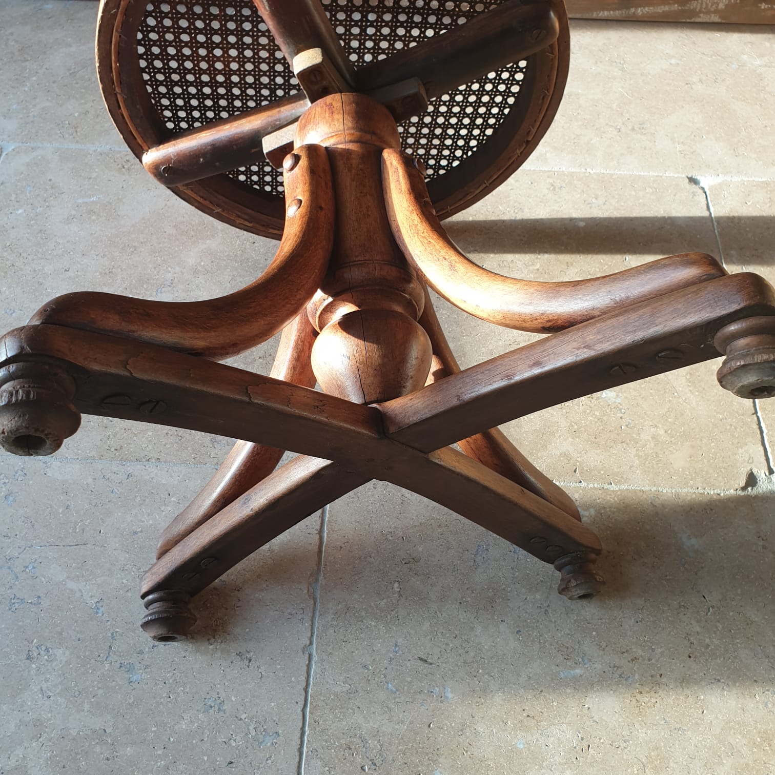 Curved wooden piano stool