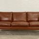Vintage danish stouby dark cognac leather and rose stained beechwood frame 3 seater sofa