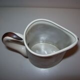 Ceramic pitcher with hand-painted decoration