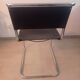 Paire de chaises en cuir noir et chrome modele Spoletto du designer Bersanelli