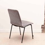 Grey fabric chair with pattern and black legs