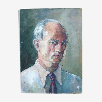 Portrait of a man with oil painting. Oil on Isorel. Oil painting. 1930s. Vintage portrait.