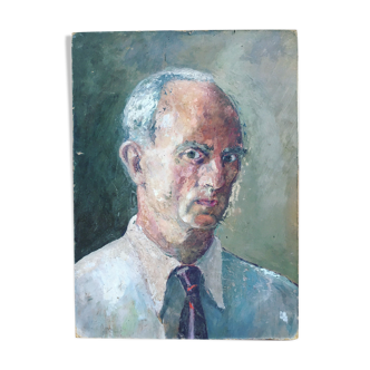 Portrait of a man with oil painting. Oil on Isorel. Oil painting. 1930s. Vintage portrait.