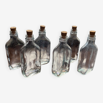 6 small glass bottles