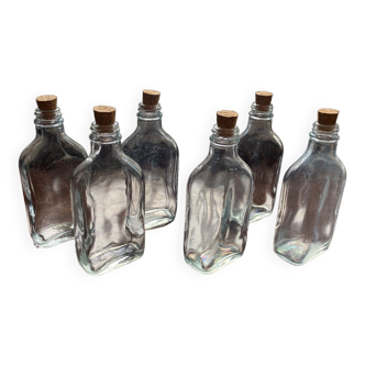 6 small glass bottles