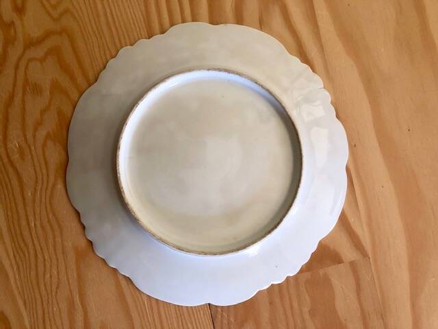 antique earthenware plate with cherries