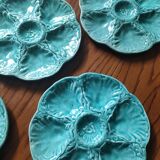 6 oyster plates in Gien slip.