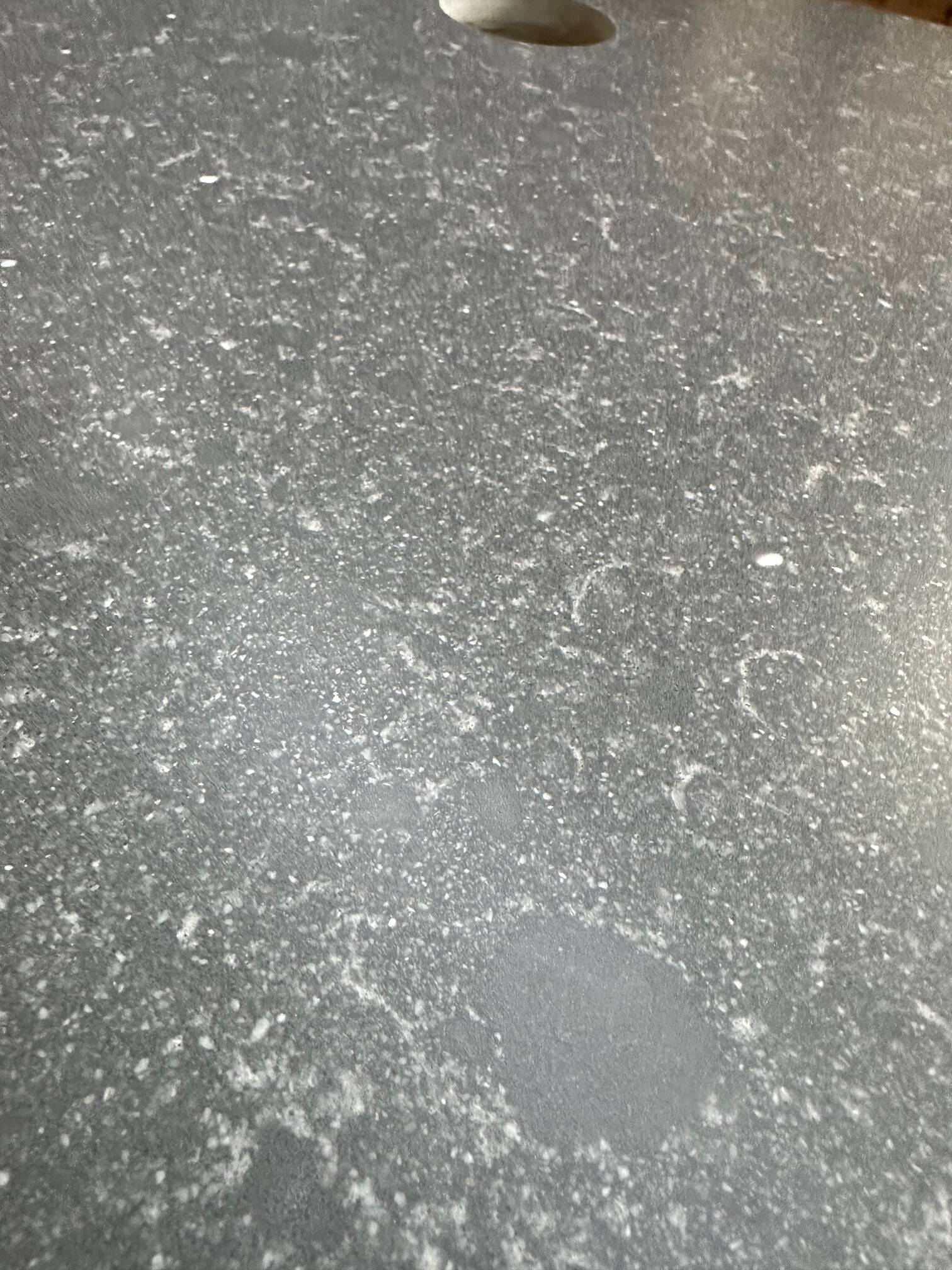 Huge bar counter covered in blue stone