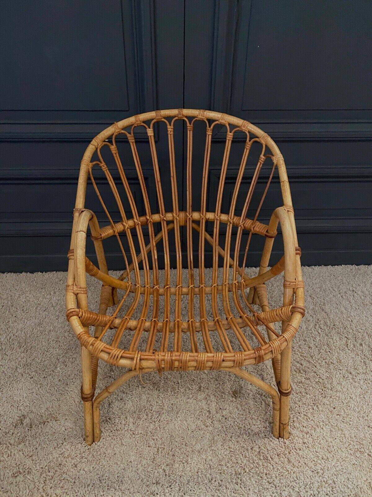Paire de fauteuils en rotin, travail français 1960