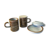 6 coffee cups and sandstone subcups