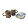 6 coffee cups and sandstone subcups