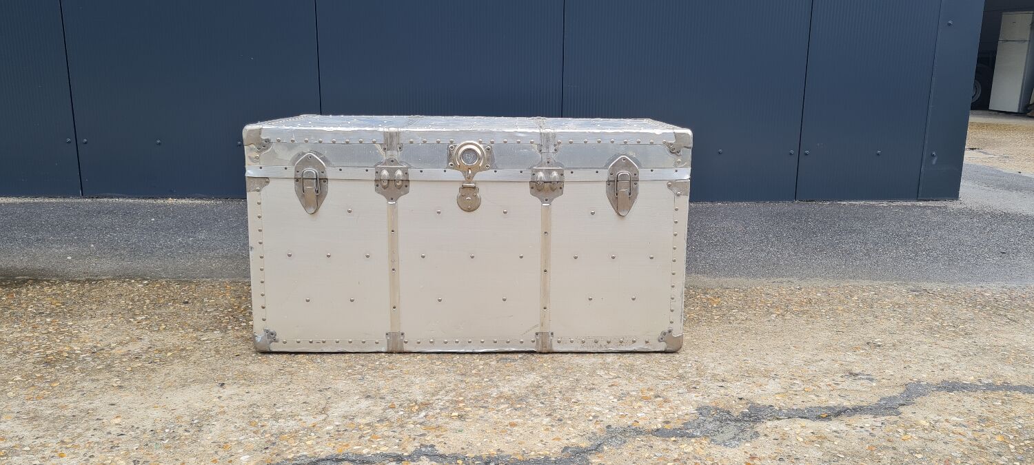 Riveted metal transport trunk