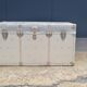 Riveted metal transport trunk