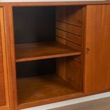 Classic shelving system from the 1950s in teak veneer by Poul Cadovius for Cado